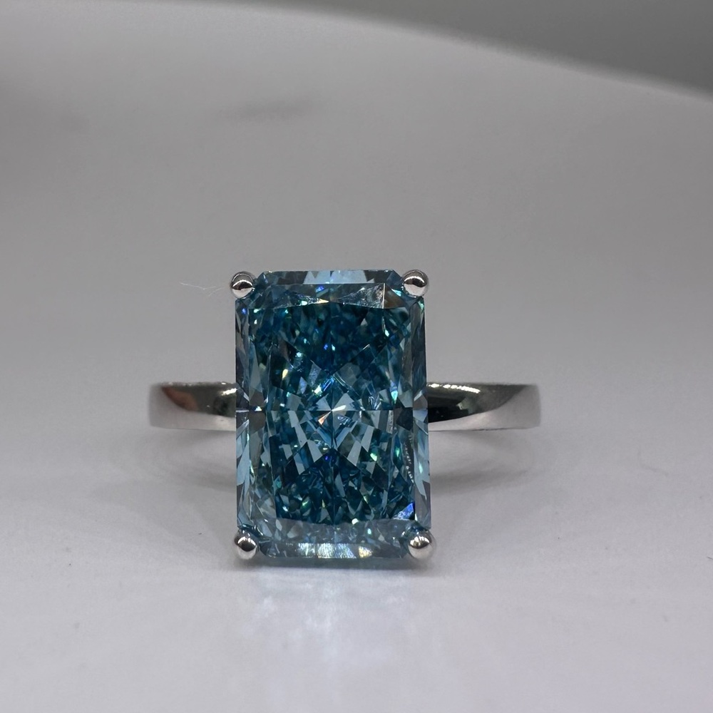 3.41 carat fancy vivid blue vvs2 radiant cut diamond engagement ring